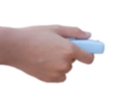 Auto remote key pressed by the finger isolate blur background. Stock Photos