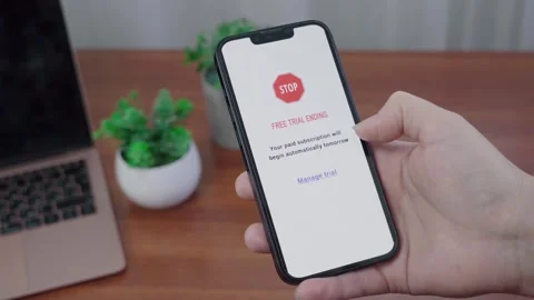 Auto Renewal AI Message About Free Trial Ending on Phone Stock Footage 340965372