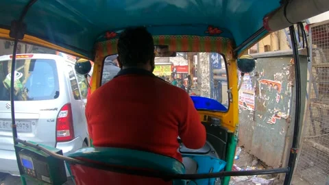 Auto Rickshaw Drives Through Chandni Chowk Streets, Old Delhi - India Stock Footage 147404392