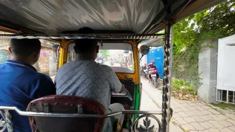 Auto Rickshaw Driving on Crowded Street in Dum Dum, West Bengal Video stock 311526447