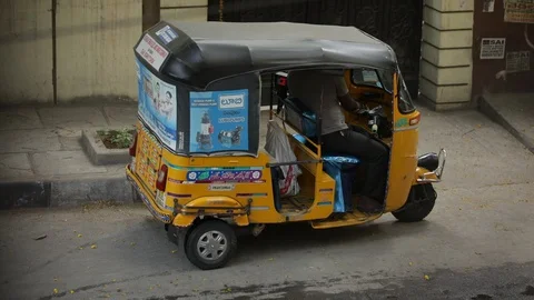 Auto-rickshaw-parked Stock Footage 127947354