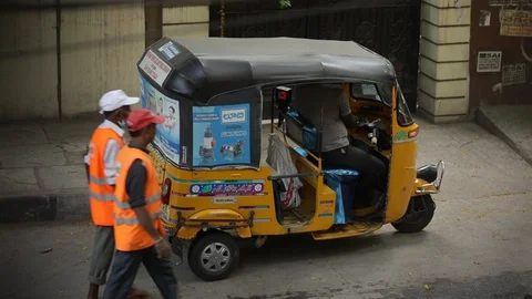 Auto-rickshaw-parked-on-the-street Stock Footage 127947372
