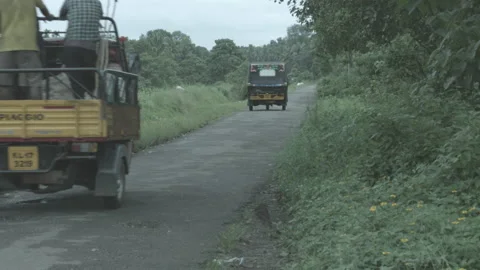 Auto rickshaw passed by on a suburban Road Video stock 200981704