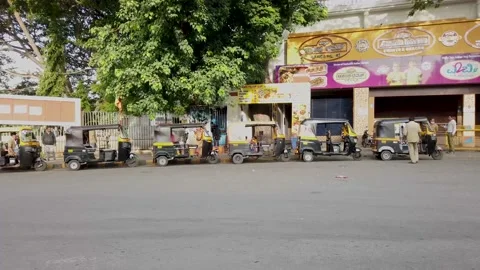 Auto rickshaws are a popular mode of transportation in India. Stock Footage 156085714
