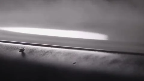 Auto Spray paint applied by compressor machine onto car bodywork CLOSE UP Stock Footage 262295450