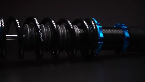 Auto suspension tuning coilovers shock absorbers and springs Stock Footage 236617601