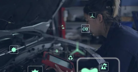 Auto technician retrieving tablet, connecting diagnostic port and monitoring CO2 Video stock 310153359