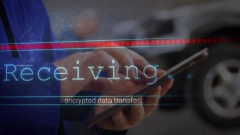 Auto technician tapping device receiving encrypted transfer overlay bar turning Stock Footage 317741583