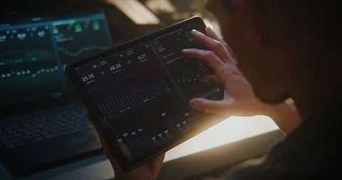 Auto Technician Using Tablet For Engine Diagnostics in Workshop Video stock 329384654