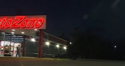 Auto Zone Store Front - Dusk - Pan Stock Footage 89031890