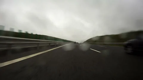 Autobahn at rain, drivers point of view Stock Footage 167309551
