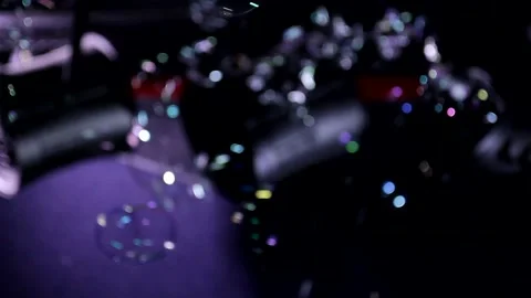 Autofocus animation close up shot of soap bubbles moving flying in air chaotical Stock Footage 138774043