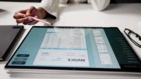 Automate Electronic Invoice Preparation With Calculating Software Stock Footage 311200297