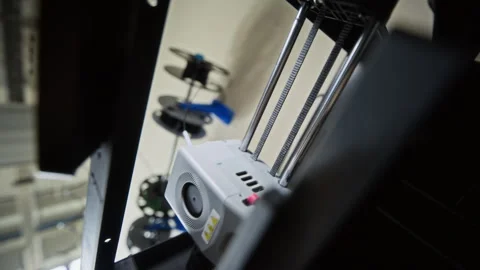 Automated 3d Printer Fabricating Robotic Parts in Workshop Stock-Footage 343503437