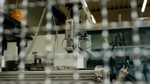 Automated Assembly Machine Behind a Safety Guard, Smart Factory, Medium Shot Vídeo Stock 341434785
