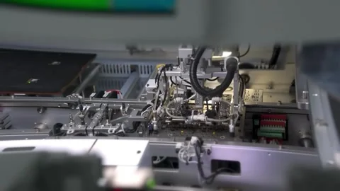 Automated assembly machine working in electronics factory Видео 347981403