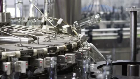Automated Bottling Process in Modern distillery Factory Enhances Efficiency and Stock Footage 291590202