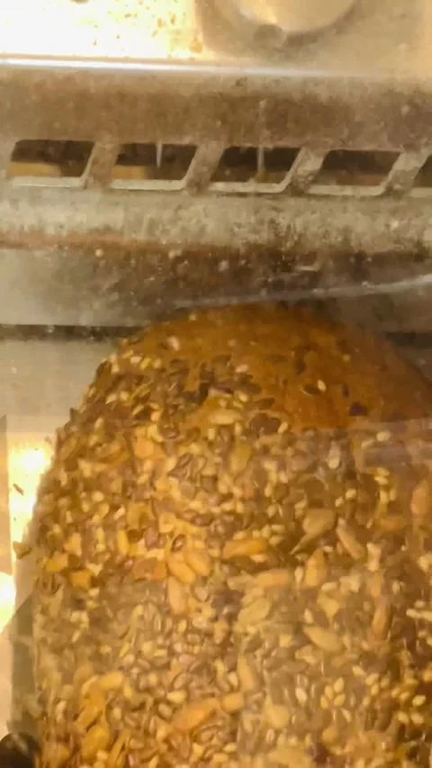 Automated bread slicing robot used in self service area. Technology Stock Footage 327921310
