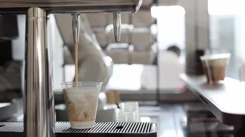 Automated cafe with robotic arm serving beverage. Video stock 330883326