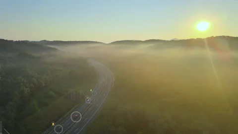 Automated car tracking system, self driving cars on road, satellite aerial Stock Footage 138608055