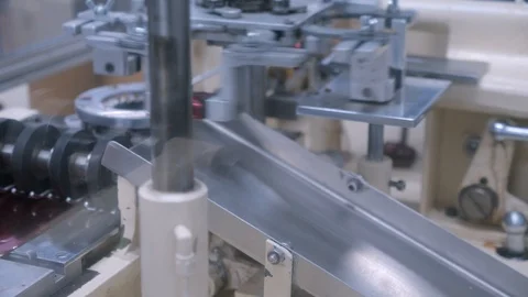 Automated chocolate candy wrapping machine Stock Footage 108399120