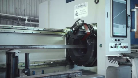 Automated cnc machine processing metal beam in factory Stock Footage 318190003