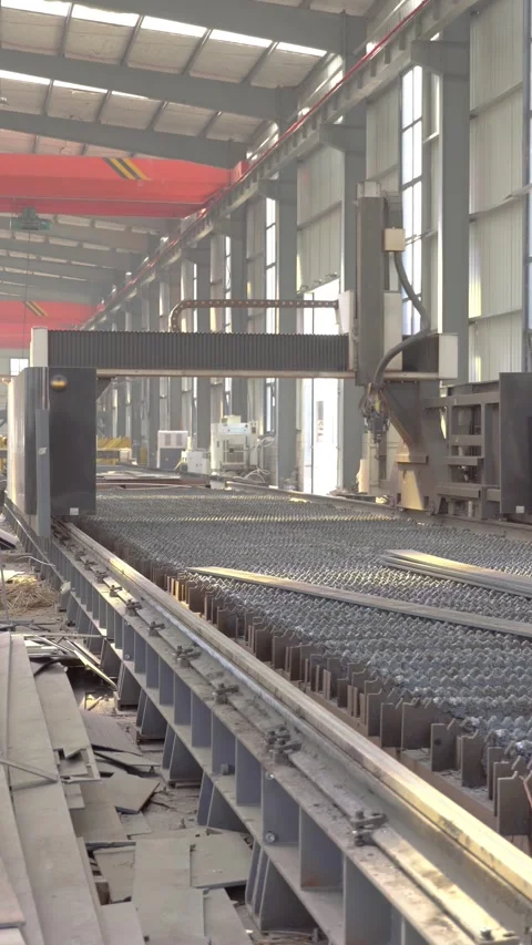 Automated CNC Plasma Cutting Machine in Steel Fabrication Factory Workshop Stock Footage 339383970