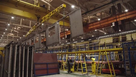 Automated crane is moving with steel structures for train car assembly. working Stock Footage 202050087
