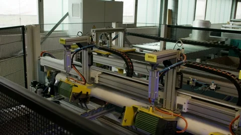Automated Gantry Transporting Material Roll, Modern Film Factory, Wide Shot Stock Footage 341300140