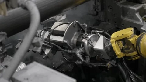 Automated high-pressure die-casting machine spraying lubricant and closing Stock Footage 332918026