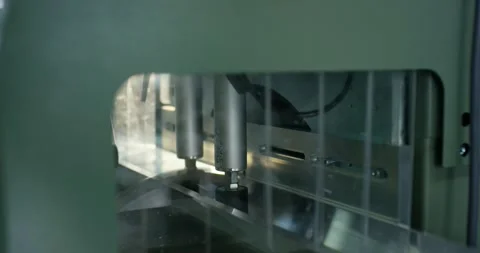 Automated Industrial Machine Processing Clamped Part, Bright Light, Close Up Stock-Footage 340363505