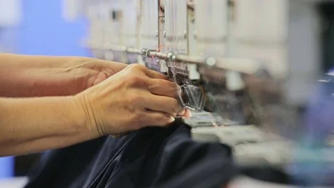 Automated industrial sewing machine Stock Footage 69856192