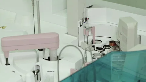 Automated laboratory analyzer for high-precision clinical chemistry testing. Stock Footage 329998314