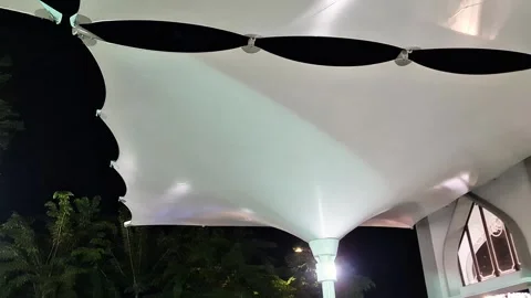 Automated Large Tensile Umbrella Structure Opening at Night 스톡 동영상 333021292