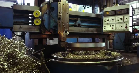 Automated lathe. The process of metal cutting at a modern production facility. Stock Footage 166028616