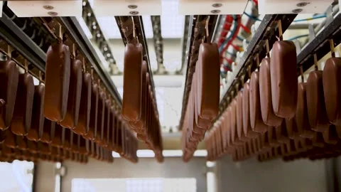 Automated line for the production of ice cream. Ready ice cream goes on the Stock Footage 194574019