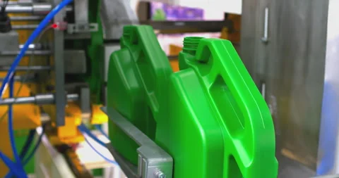 Automated line for the production of plastic containers for motor oil. Stock Footage 329222841