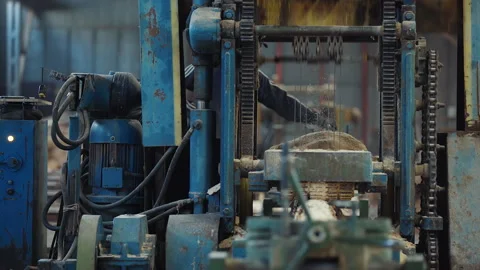 Automated Lumber Manufacturing Machine Cuts Wooden Log With Heavy Saws Stock Footage 206167141