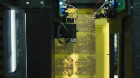 Automated machine assembling electronic circuit boards in factory Stock Photos