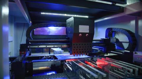 Automated machine assembling electronic components in factory Stock Photos