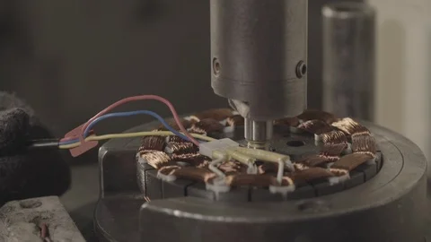 Automated machine installing rod in rotor - Shot on Sony FS7 Stock-Footage 91176379