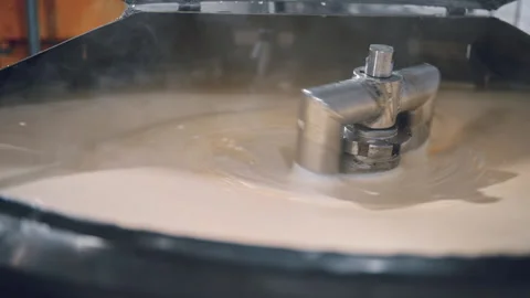 Automated Machine Mixing Liquid Vanilla Ice Cream In Tank At Milk Food Factory Vídeos de archivo 167416757