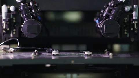 Automated machine operates with radio set detail at plant Stock Footage 122359059