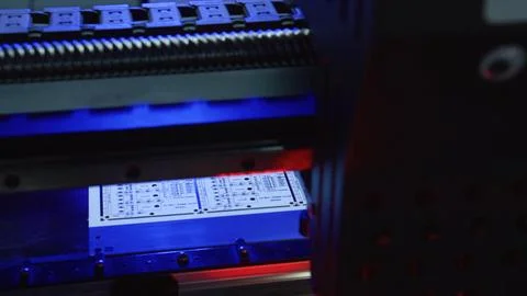 Automated machine printing electronic circuit boards in factory Stock Photos