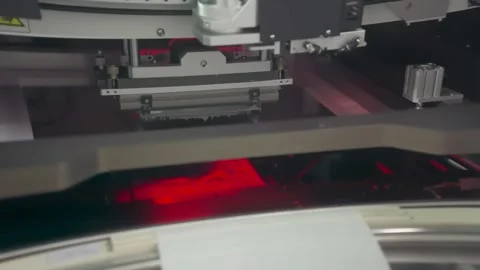 Automated machine with red laser light Видео 347981390