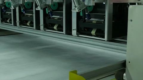 Automated machine shot of fabric rolled out in textile factory Stock-Footage 62442091