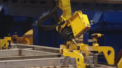 Automated machine welding metal structures in the production workshop. laser Stock Footage 202049419