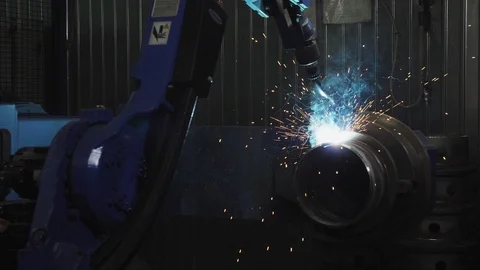 Automated machine welds metal pipe in plant workshop Video stock 122218432