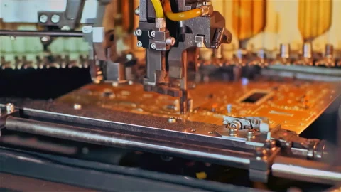 Automated Mechanical Head Assembling PCB Board in Electronics Factory - 4K Stock Footage 326924569