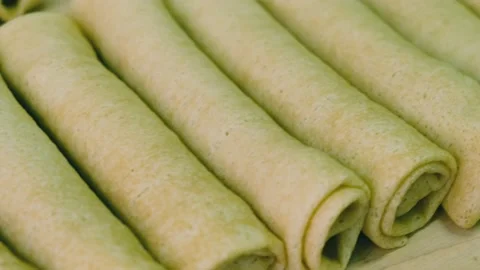 Automated pancake making process at a ready-made food factory Stock Footage 169141688